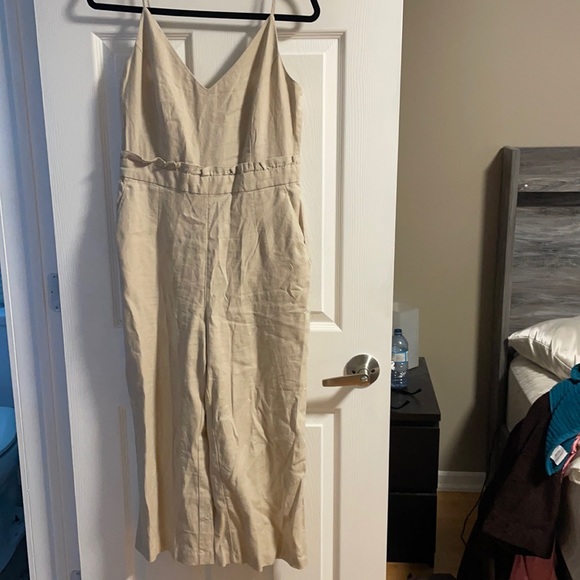 Brand new never worn . Woman’s romper in small . - Picture 1 of 5